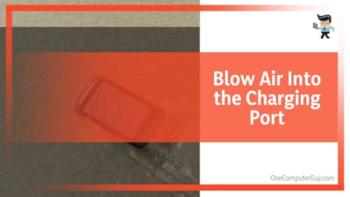 Blow Air Into the Charging Port